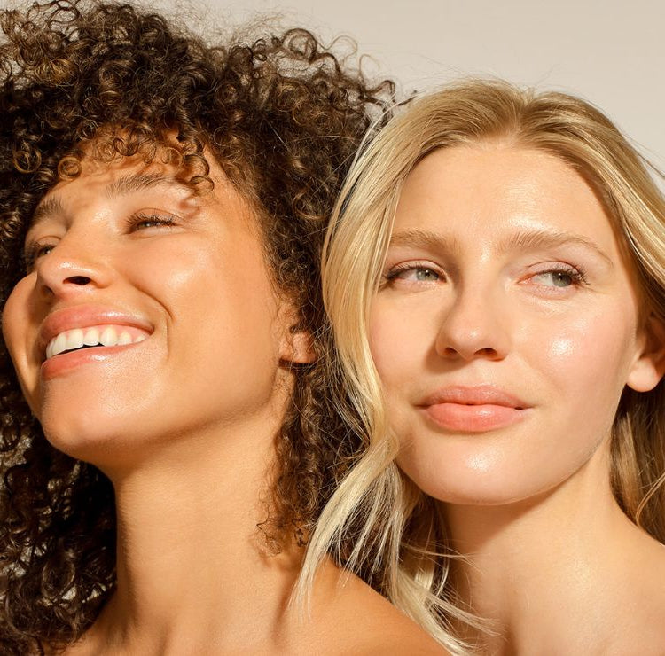 Two models smiling