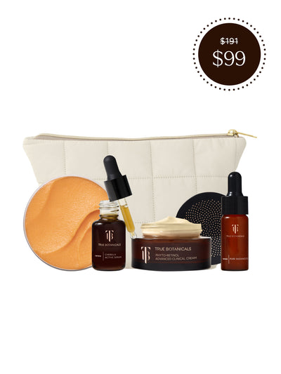 Skincare product set with a white pouch, including jars, bottles, and a round disc, with a price tag of $99.