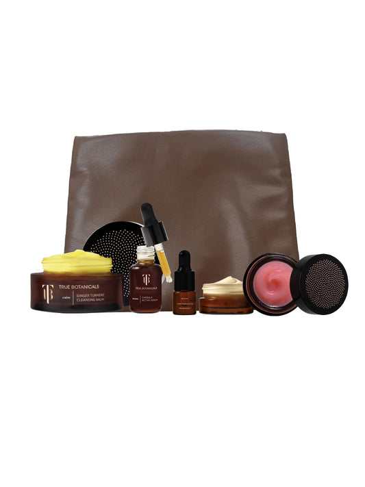 Skincare product set with a brown bag on a white background