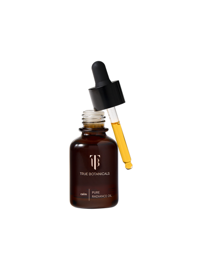 True Botanicals Calm Pure Radiance Oil bottle with dropper on a white background