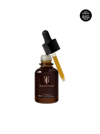 True Botanicals Renew Chebula Active Serum in a deep amber glass dropper bottle with a black rubber bulb top and gold logo, shown on a transparent background with an InStyle 2025 Beauty Editors' Pick badge.
