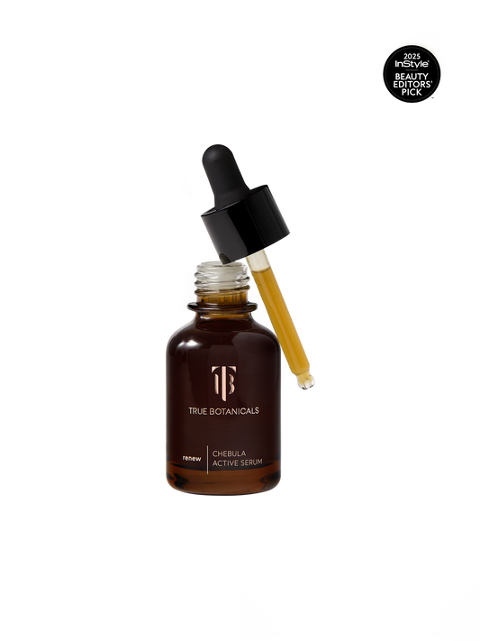 True Botanicals Renew Chebula Active Serum in a deep amber glass dropper bottle with a black rubber bulb top and gold logo, shown on a transparent background with an InStyle 2025 Beauty Editors' Pick badge.