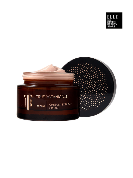 True Botanicals Renew Chebula Extreme Cream in a deep amber glass jar with a dark lid and gold logo, shown on a transparent background with an ELLE 2022 Green Beauty Stars badge.