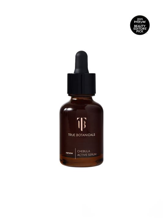 True Botanicals Chebula Active Serum bottle with dropper on a cream background