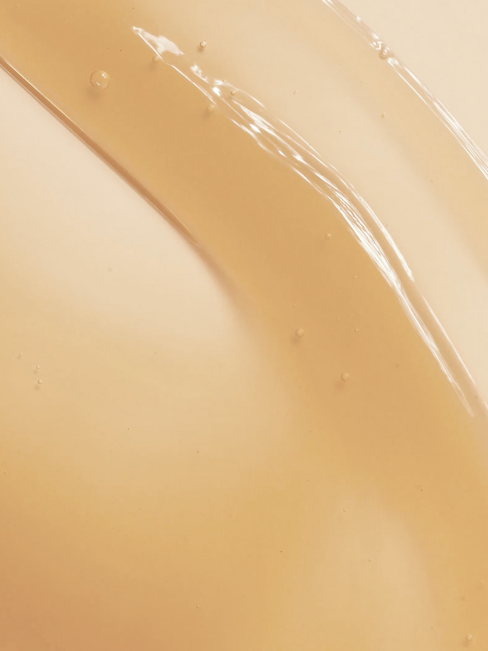 Close-up texture swatch of True Botanicals Lipid Lip Hydrating Lip Oil.