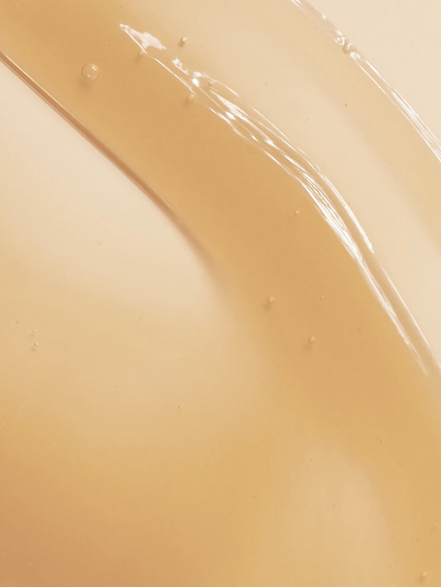 Close-up texture swatch of True Botanicals Lipid Lip Hydrating Lip Oil.