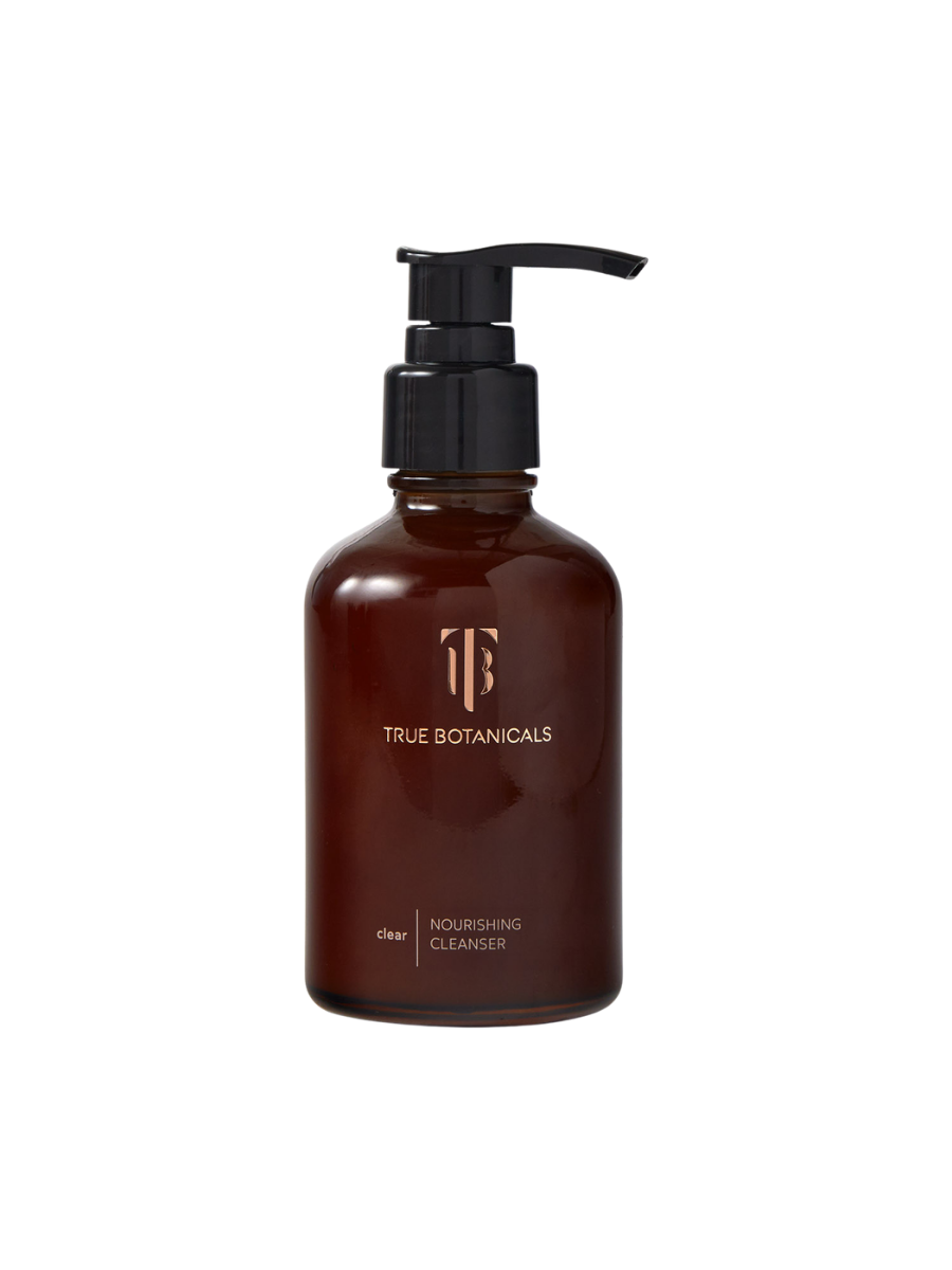 Brown bottle with pump labeled 'True Botanicals' on a white background