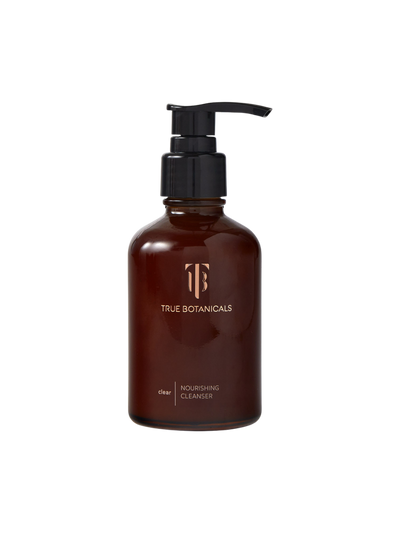 Brown bottle with pump labeled 'True Botanicals' on a white background