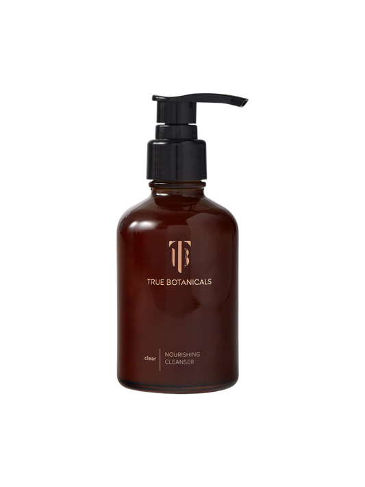 Brown bottle with pump labeled 'True Botanicals' on a white background