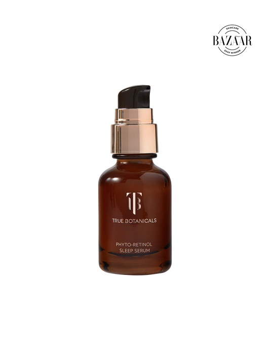 Brown serum bottle with black cap on a white background, featuring the 'Bazaar' logo.
