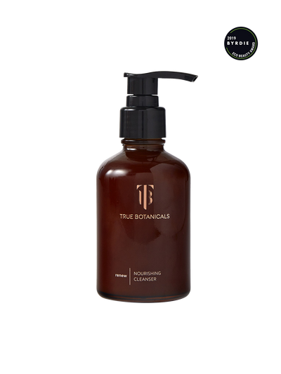 Brown bottle with pump labeled 'True Botanicals' on a white background