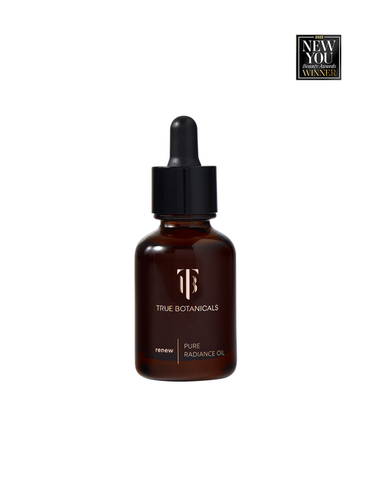True Botanicals pure radiance oil bottle with dropper on a white background