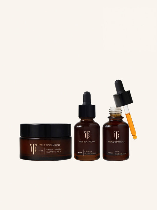 Three skincare products from True Botanicals on a light beige background