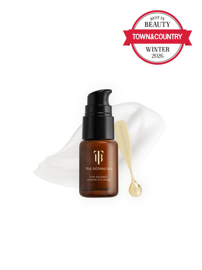 Brown serum bottle with black cap on a white background, featuring Town & Country Beauty award.